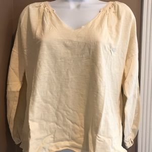 Woman’s yellow Joe’s Jeans top